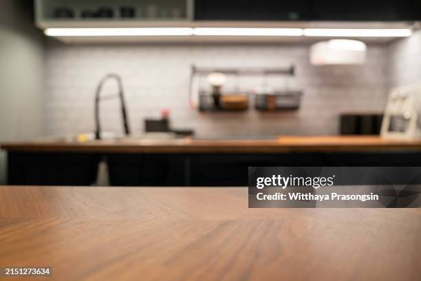 wood table top on blur kitchen counter (room)background. - disk bildbanksfoton och bilder
