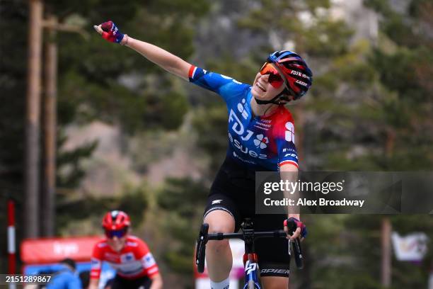 Evita Muzic of France and Team FDJ - SUEZ celebrates at finish line as stage winner ahead of Demi Vollering of The Netherlands and Team SD Worx -...