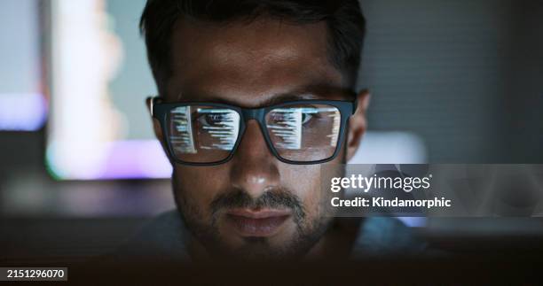 hispanic latin american man, software engineer developer use computer at home office, work on program coding at night. programming language development technology, freelance work from home concept - eye reflection stock pictures, royalty-free photos & images