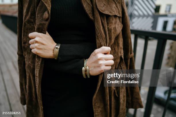 close-up portrait of a beautiful woman - suede jacket stock pictures, royalty-free photos & images