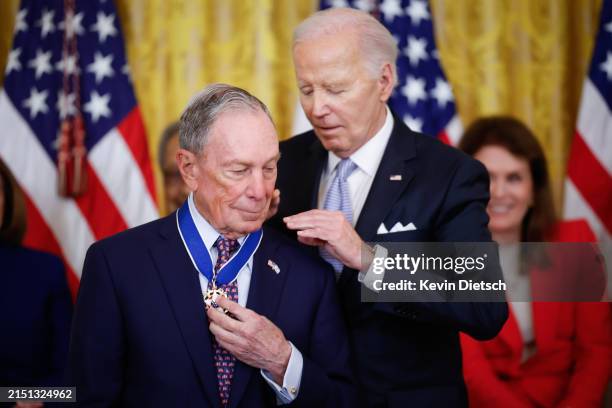 President Joe Biden awards the Medal of Freedom to former New York Mayor Michael Bloomberg during a ceremony in the East Room of the White House on...