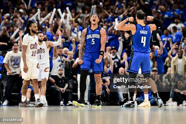 Paolo Banchero of the Orlando Magic celebrates with Jalen Suggs after a basket against the Cleveland Cavaliers during the fourth quarter in Game Six...