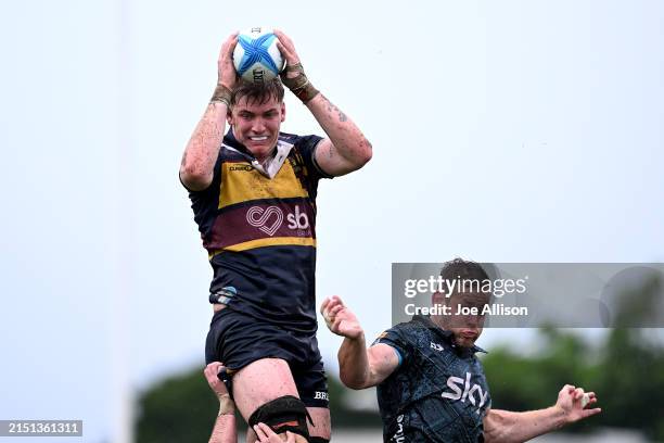 Fabian Holland of the Highlanders collects the ball from a lineout during the round 11 Super Rugby Pacific match between Moana Pasifika and...