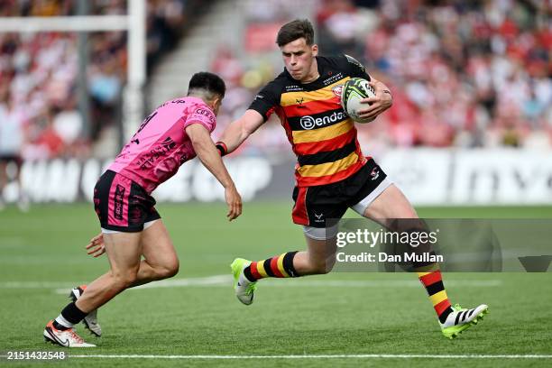 Seb Atkinson of Gloucester Rugby runs with the ball whilst under pressure from Tomas Albornoz of Benetton Rugby during the EPCR Challenge Cup Semi...