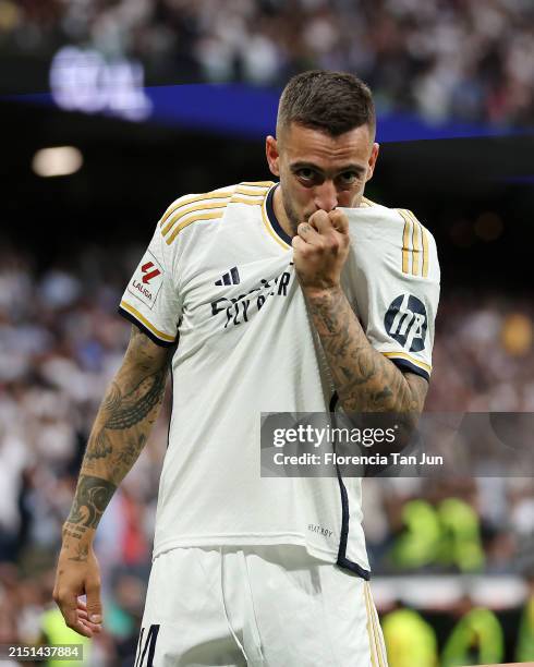 Joselu of Real Madrid celebrates scoring his team's third goal during the LaLiga EA Sports match between Real Madrid CF and Cadiz CF at Santiago...