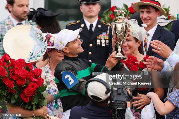 Mystik Dan's jockey Brian Hernandez Jr. Celebrates with the trophy after winning the 150th running of the Kentucky Derby at Churchill Downs on May...