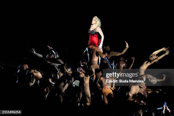 American singer Madonna performs on stage during a massive free show to close "The Celebration Tour" at Copacabana Beach on May 04, 2024 in Rio de...
