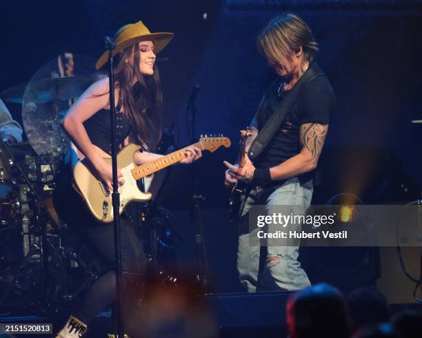 Maggie Baugh and Keith Urban perform onstage at the 2024 iHeartCountry Festival - Show at Moody Center on May 04, 2024 in Austin, Texas.