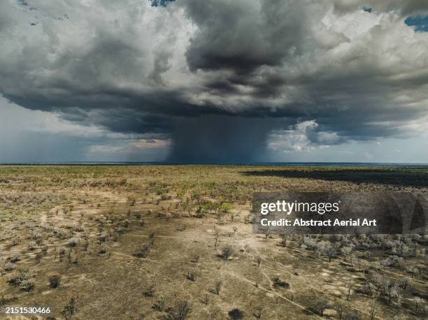 aerial image showing a microburst over the australian outback, northern territory, australia - ominous stock pictures, royalty-free photos & images