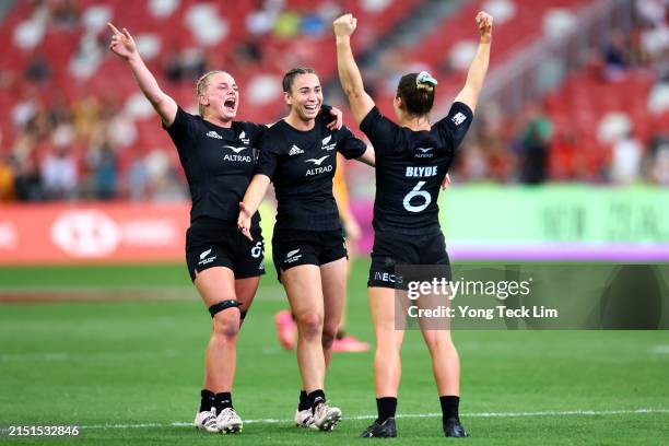 Jorja Miller, Jazmin Felix-Hotham and Michaela Blyde of New Zealand celebrate after defeating Australia in the women's cup final during day three of...