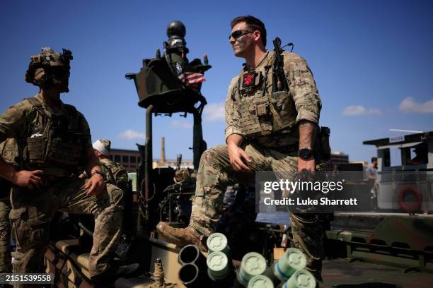 Navy Special Warfare Combatant-Craft Crewmen are pictured aboard a Special Operations Craft Riverine boat before participating in a capabilities...