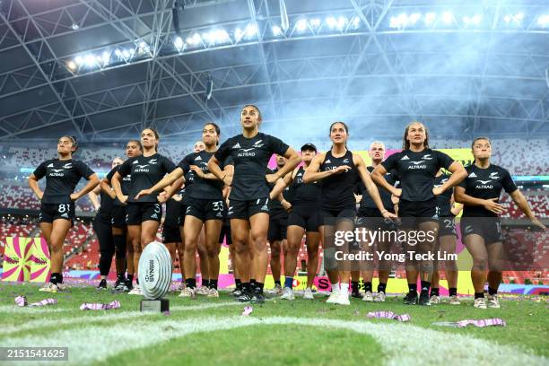 New Zealand players perform the haka after defeating Australia in the women's cup final during day three of the HSBC SVNS Singapore at the National...