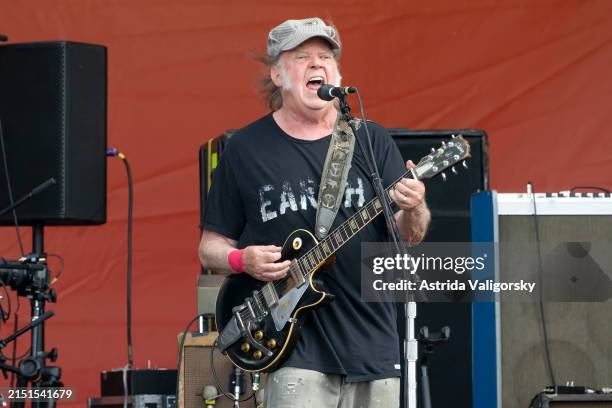 Neil Young performs on Day 7 of 2024 New Orleans Jazz & Heritage Festival at Fair Grounds Race Course on May 04, 2024 in New Orleans, Louisiana.
