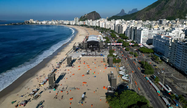BRA: Cleaning Efforts At Copacabana Beach After Madonna's Massive Show