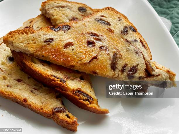 rasin bread toast with melted butter - raisin toast stock pictures, royalty-free photos & images
