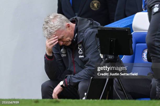 David Moyes, Manager of West Ham United, looks dejected during the Premier League match between Chelsea FC and West Ham United at Stamford Bridge on...