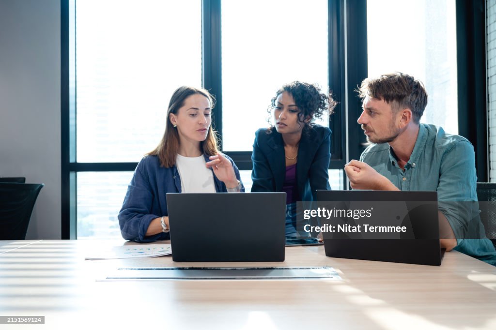 Increases team agility, productivity, and efficiency with digital transformation in your business operation. Tech team on a meeting to share and brainstorm ideas for new products and market strategies in a startup business office space.