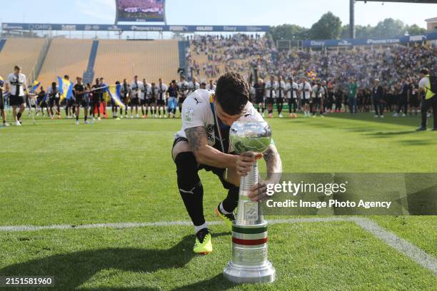 Enrico Delprato of Parma celebrates the conquest of Serie A at the end the Serie B match between Parma Calcio 1913 and US Cremonese at Stadio Ennio...