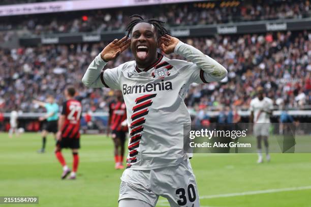 Jeremie Frimpong of Bayer Leverkusen celebrates scoring his team's fourth goal during the Bundesliga match between Eintracht Frankfurt and Bayer 04...