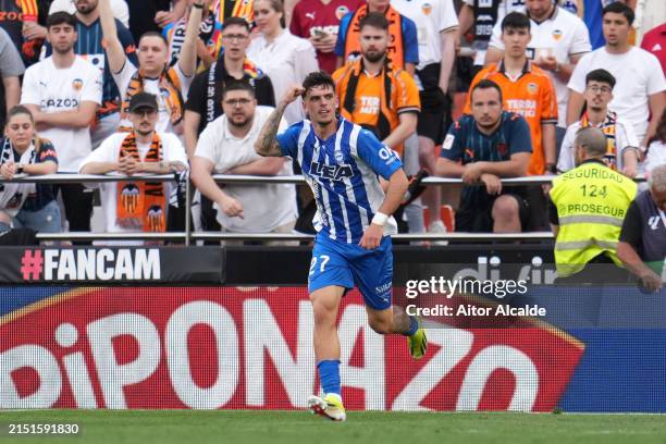 Javi Lopez of Deportivo Alaves celebrates scoring his team's first goal during the LaLiga EA Sports match between Valencia CF and Deportivo Alaves at...
