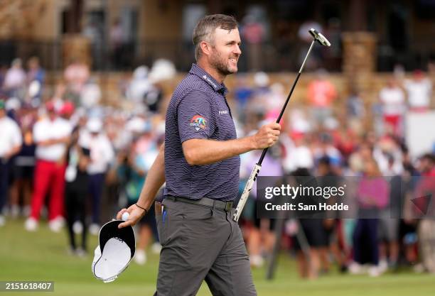 Taylor Pendrith of Canada reacts after putting in to win on the 18th green during the final round of THE CJ CUP Byron Nelson at TPC Craig Ranch on...