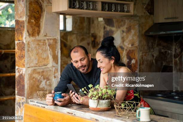 couple are enjoying the time in their holidays - latin script stock pictures, royalty-free photos & images
