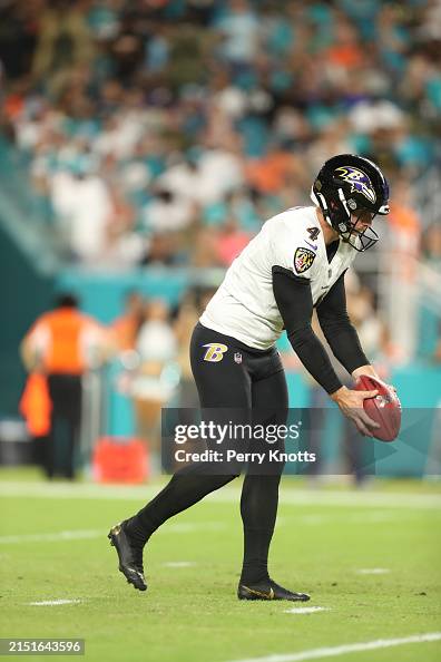 Sam Baltimore Sam Koch of the Baltimore Ravens punts during an NFL football game ...
