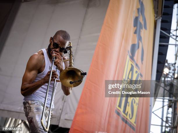 Trombone Shorty of Trombone Shorty and Orleans Avenue performs during the 2024 New Orleans Jazz & Heritage Festival at Fair Grounds Race Course on...