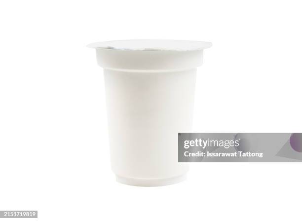 round white glossy plastic pot with foil cover for yogurt, cream, dessert or jam. - yaourt photos et images de collection