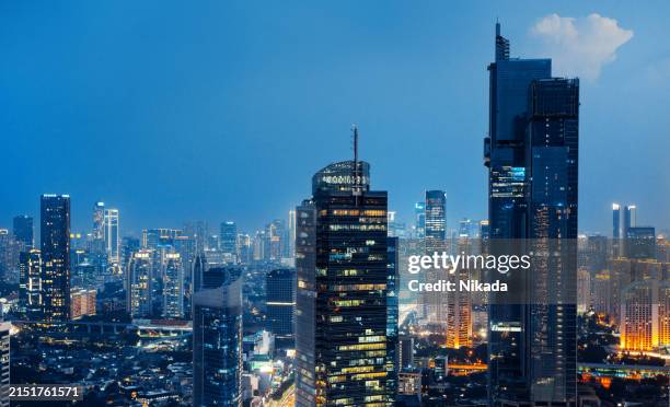 view at night, jakarta business district, indonesia - jakarta stock pictures, royalty-free photos & images