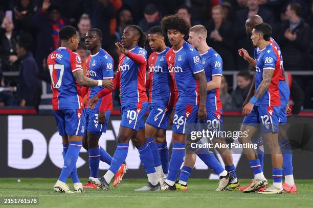 Michael Olise of Crystal Palace celebrates scoring his team's first goal with Eberechi Eze, Chris Richards and team mates during the Premier League...