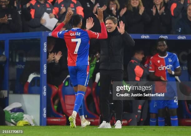 Michael Olise of Crystal Palace celebrates scoring his team's fourth goal with Oliver Glasner, Manager of Crystal Palace, during the Premier League...