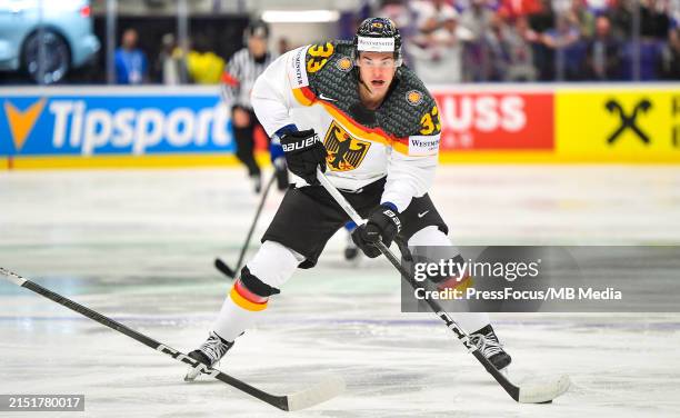John Peterka of Germany controls the puck during the 2024 IIHF Ice Hockey World Championship match between Slovakia and Germany on May 10, 2024 in...