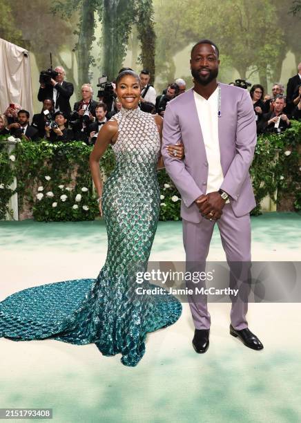 Gabrielle Union and Dwyane Wade attend The 2024 Met Gala Celebrating "Sleeping Beauties: Reawakening Fashion" at The Metropolitan Museum of Art on...