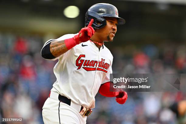 José Ramírez of the Cleveland Guardians celebrates as he rounds the bases on a solo homer during the sixth inning against the Detroit Tigers at...