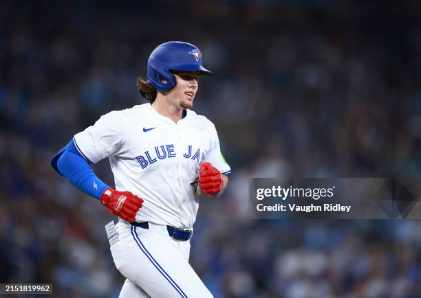 Addison Barger of the Toronto Blue Jays runs to first base during a game against the Kansas City Royals at Rogers Centre on May 01, 2024 in Toronto,...