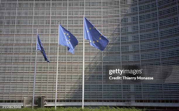 Flags raise in front of the EU Commission headquarter on May 10, 2024 in Brussels, Belgium. The Berlaymont building is the headquarters of the...