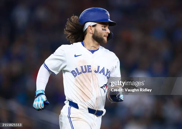 Bo Bichette of the Toronto Blue Jays runs to first base during a game against the Kansas City Royals at Rogers Centre on May 01, 2024 in Toronto,...