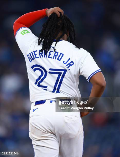 Vladimir Guerrero Jr. #27 of the Toronto Blue Jays looks on during a game against the Kansas City Royals at Rogers Centre on May 01, 2024 in Toronto,...