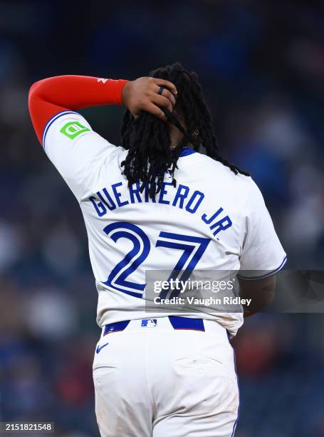 Vladimir Guerrero Jr. #27 of the Toronto Blue Jays looks on during a game against the Kansas City Royals at Rogers Centre on May 01, 2024 in Toronto,...