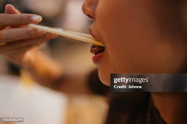 enjoying sushi - chopsticks stock pictures, royalty-free photos & images
