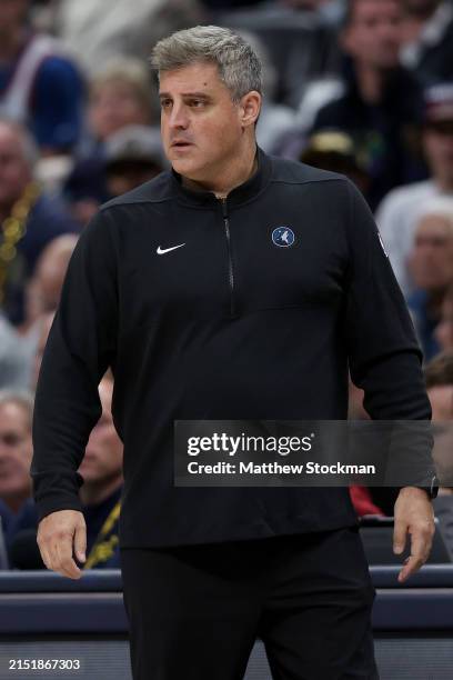 Assistant coach Micah Nori of the Minnesota Timberwolves watches as his team plays the Denver Nuggets in the first quarter during Game Two of the...