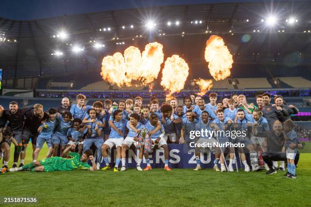The Manchester City U18s are lifting the trophy after the FA Youth Final match between Manchester City and Leeds United at the Etihad Stadium in...