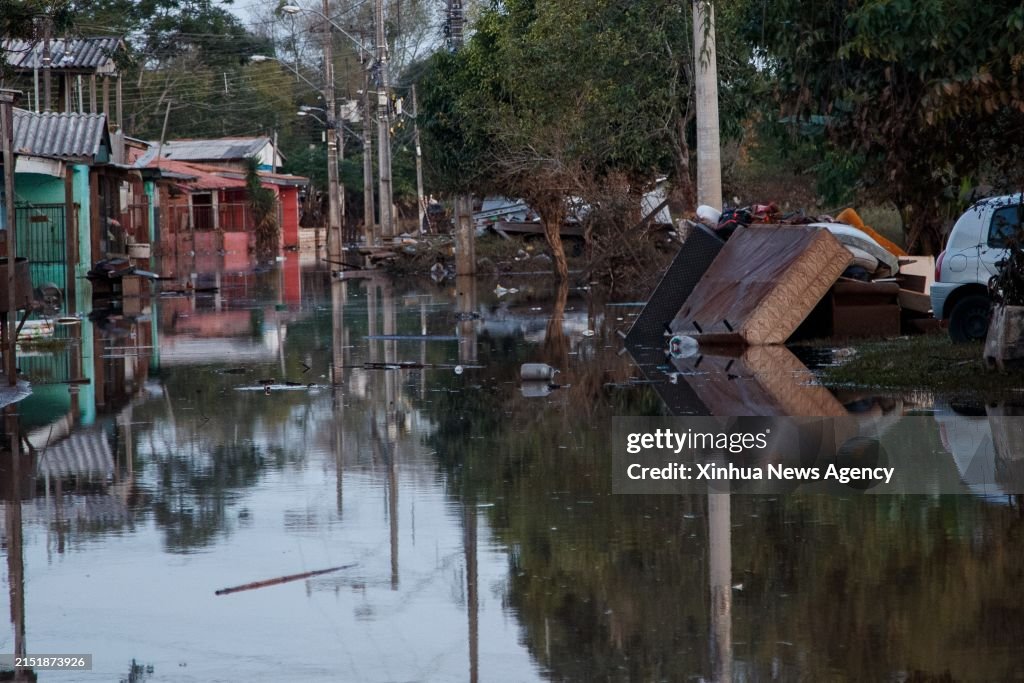 Brazil. Current Disaster This photo taken on May 9, 2024 shows a flooded street in Santo... News ...