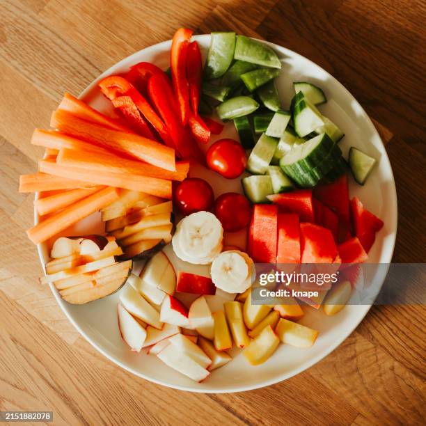 raw vegetables and fruit thats good for gut health microbiome - serving size stock pictures, royalty-free photos & images