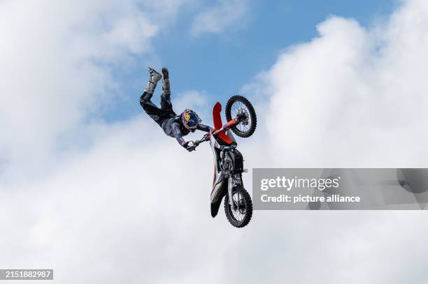 May 2024, Baden-Württemberg, Friedrichshafen: Luc Ackermann in action at an FMX show at the Tuning World Bodensee. Photo: Silas Stein/dpa