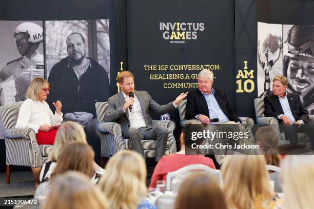 Louise Minchin, Prince Harry, Duke of Sussex, Patron of the Invictus Games Foundation, Sir Keith Mills GBE DL and Ken Fisher, FHF speak onstage...