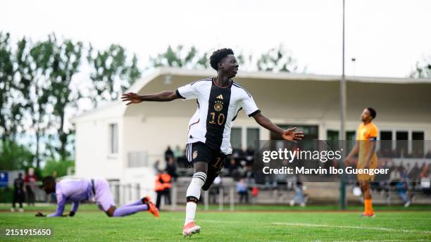 Jeremiah Gyekye Addo Debrah of Germany celebrates his team's first goal during the U15 international friendly match between Germany and Netherlands...