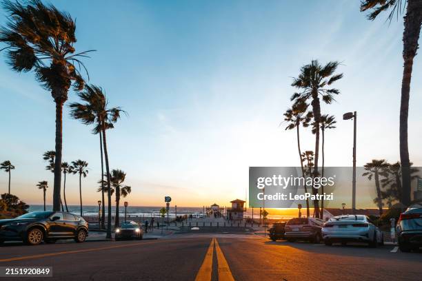 view to the pier in manhattan beach at sunset - los angeles stock pictures, royalty-free photos & images