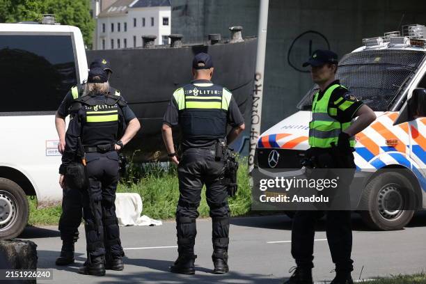 Police take measures at the designated location where the Patriotic Europeans Against the Islamisation of the West leader Edwin Wagensveld burned the...